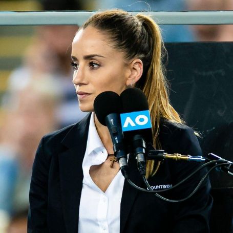marijana on the umpire chair looking at the game 